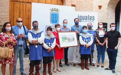 Foto de familia de todos los participantes en la presentación del cupón