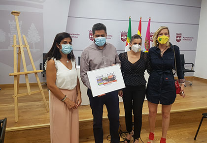 Foto de familia de la presentación del cupón del 10 de agosto dedicado al Mercado de Plasencia