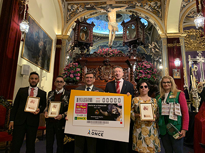 Presentación del cupón dedicado al Cristo de la Fundación de la Hermandad de los Negritos de Sevilla