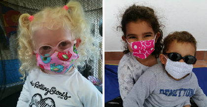 Niños con mascarillas infantiles puestas