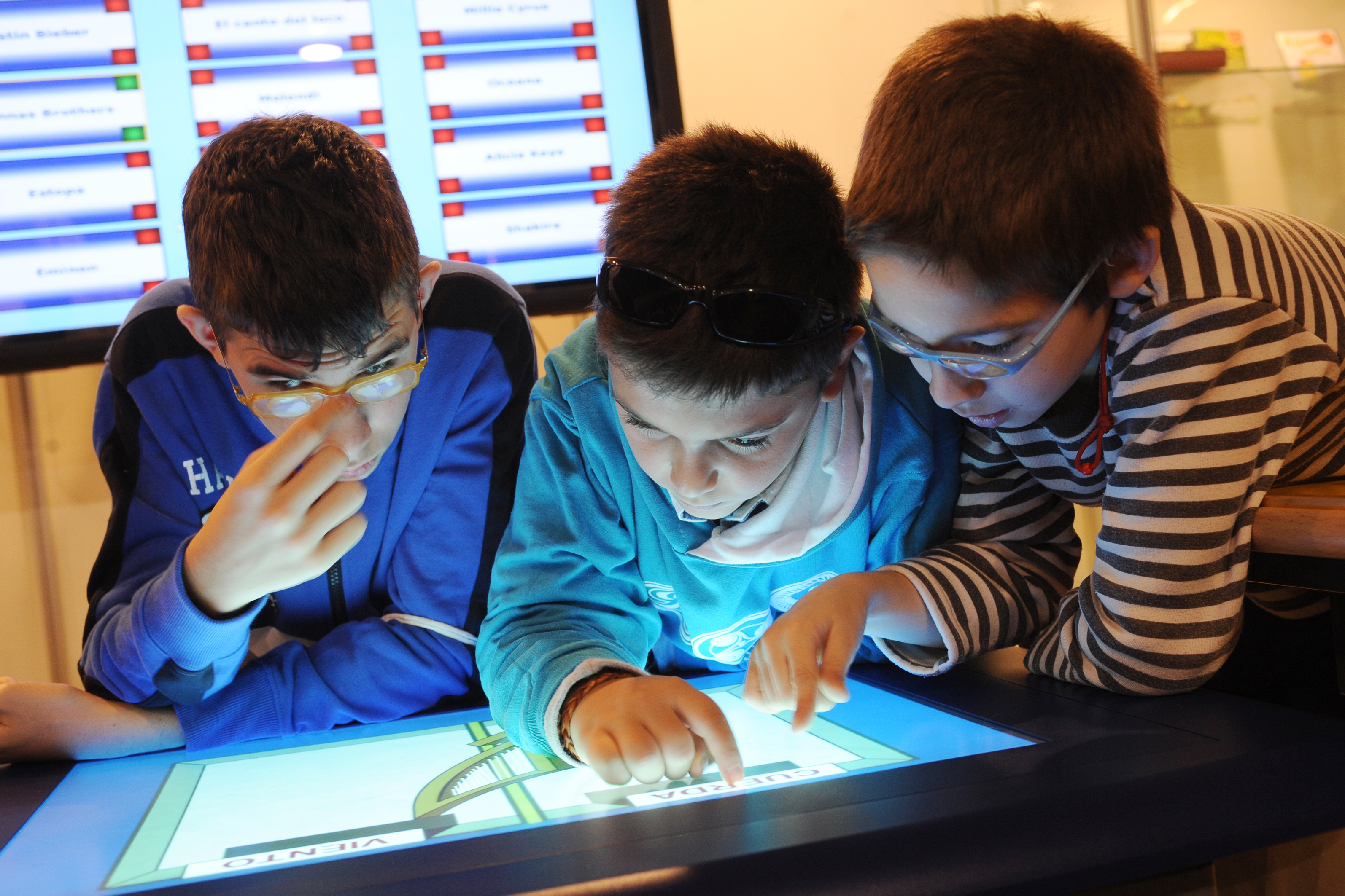 children playing with a tablet